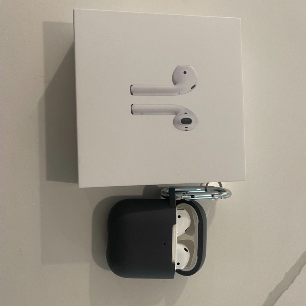 AirPods in a good condition with the box no marks, Very well-kept
